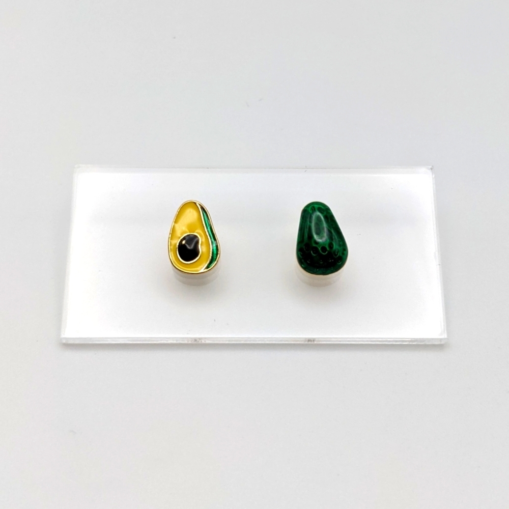 Avocado green asymmetrical stud earrings